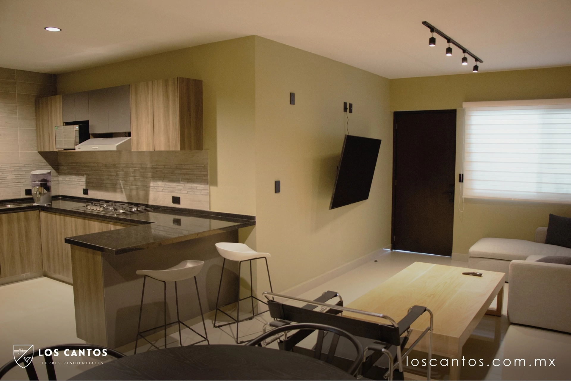 Cocina, comedor y sala del modelo Bach en Cantos Torres Residenciales